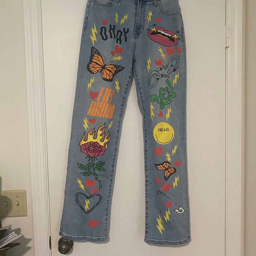 Akira High Waisted Graphic Blue Jeans with Colorful Prints
